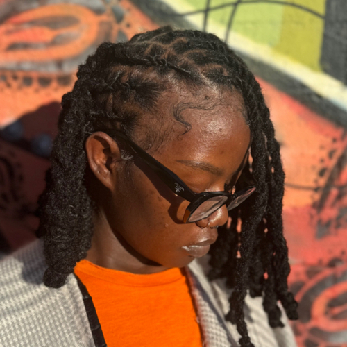 Loc retwist and style by Pixie Loc Wizard